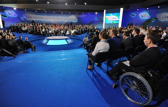Russian President Vladimir Putin participates in plenary session of Russian Popular Front’s forum