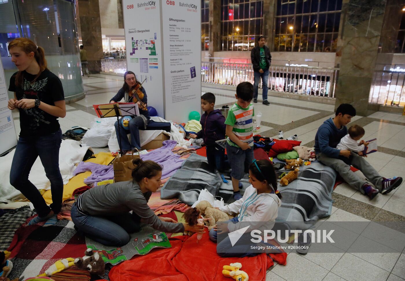 Refugees from Middle East at Westbahnhof railway station in Vienna