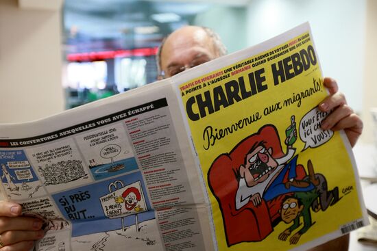Charlie Hebdo published cartoons mocking drowned Syrian boy