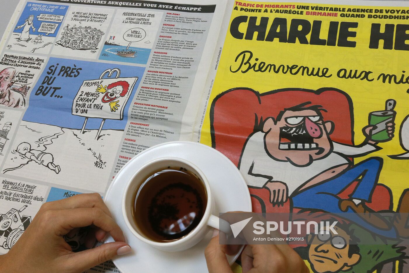 Charlie Hebdo published cartoons mocking drowned Syrian boy