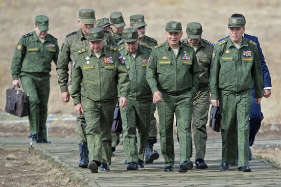 Russian Defense Minister Shoigu arrives at Donguz base for Tsentr-2015 drill