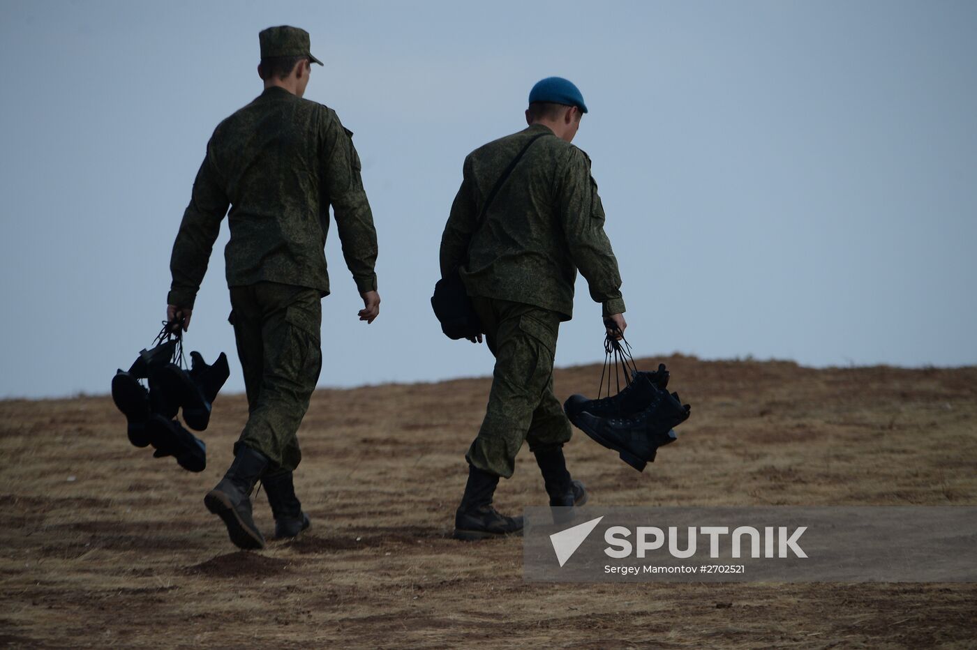 Russian Defense Minister Shoigu arrives at Donguz base for Tsentr-2015 drill
