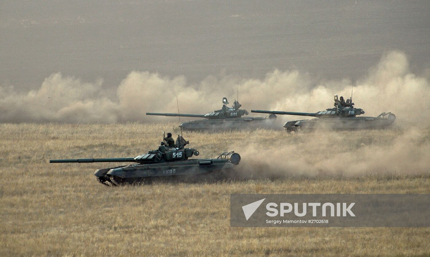 Russian Defense Minister Shoigu arrives at Donguz base for Tsentr-2015 drill