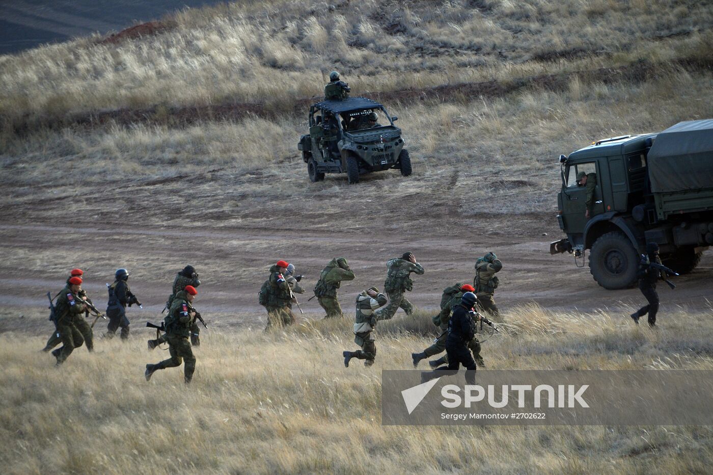 Russian Defense Minister Shoigu arrives at Donguz base for Tsentr-2015 drill