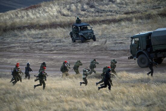 Russian Defense Minister Shoigu arrives at Donguz base for Tsentr-2015 drill