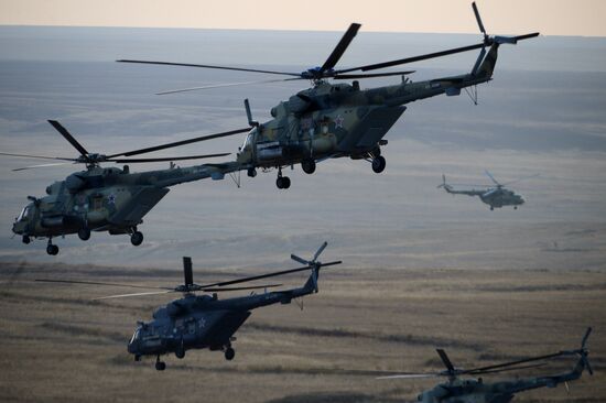 Russian Defense Minister Shoigu arrives at Donguz base for Tsentr-2015 drill