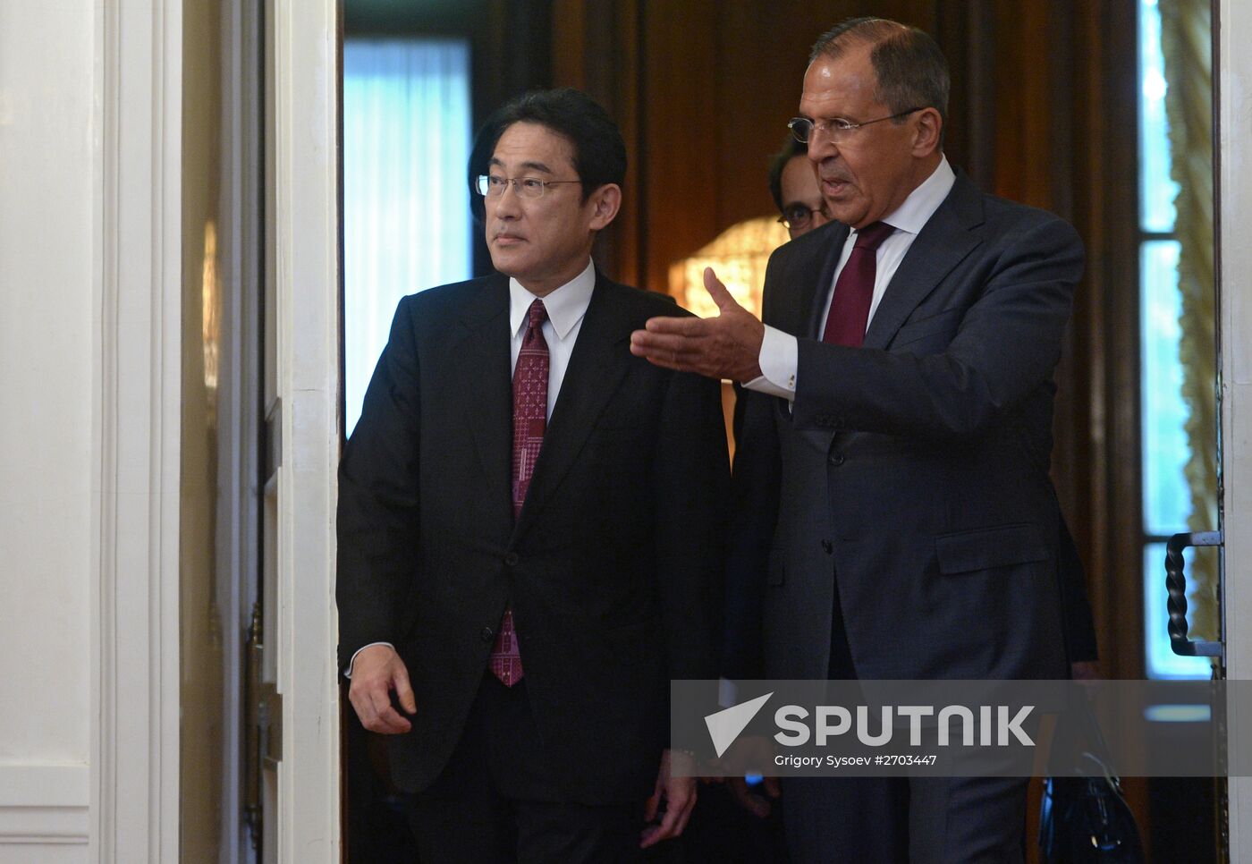 Russian Foreign Minister Sergey Lavrov meets with his Japanese counterpart Fumio Kishida