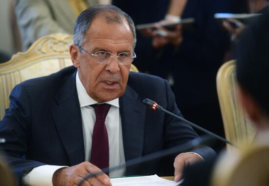 Russian Foreign Minister Sergey Lavrov meets with his Japanese counterpart Fumio Kishida
