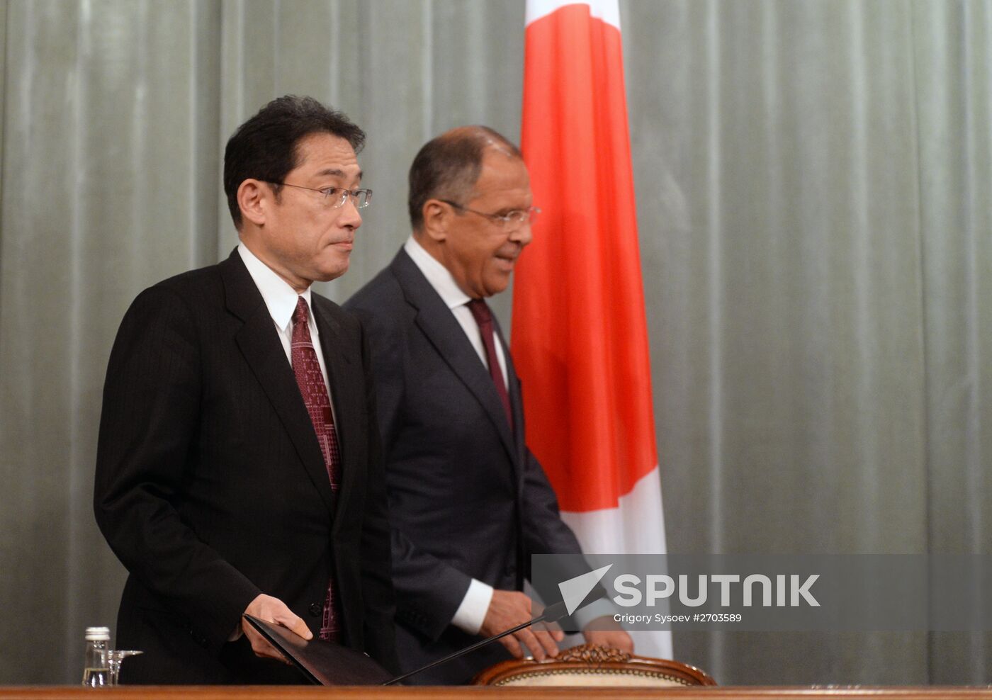 Russian Foreign Minister Sergey Lavrov meets with his Japanese counterpart Fumio Kishida