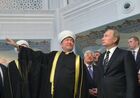 September 23, 2015. President Vladimir Putin, front right, during the visit to the Moscow Cathedral Mosque after the ceremonial opening. Front left: Ravil Gainutdin, Chairman of the Russian Mufti Council. Back center: President of Palestine Mahmoud Abbas. Location: Russia, Moscow. Author: Alexei Druzhinin/Sputnik. President Vladimir Putin attends opening of renovated Moscow Cathedral Mosque