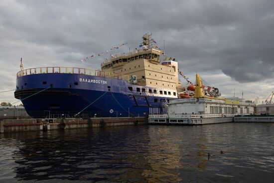 Hoisting the Russian state flag aboard the icebreaker Vladivostok