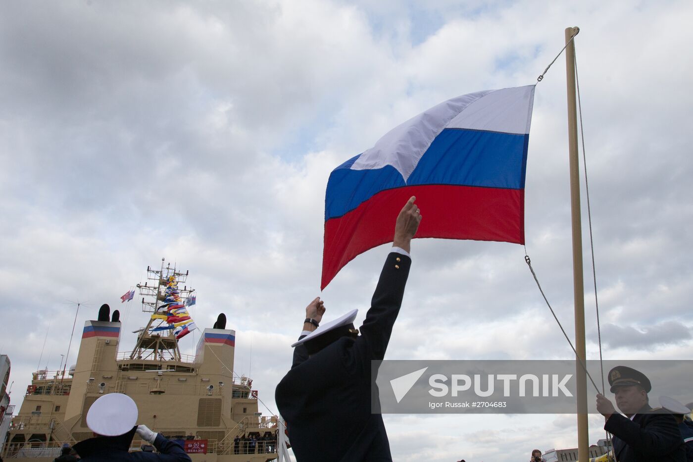 Hoisting the Russian state flag aboard the icebreaker Vladivostok