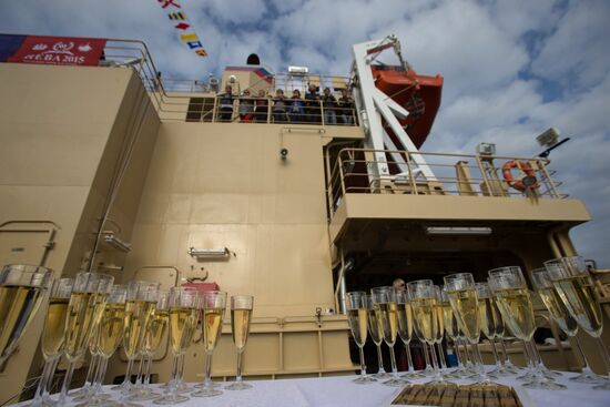 Hoisting the Russian state flag aboard the icebreaker Vladivostok