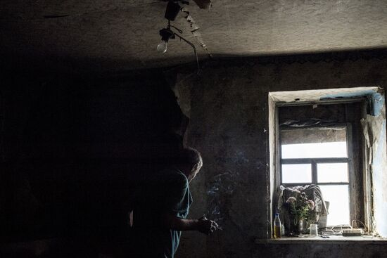 Residents of Staromikhailovka village in Donetsk region