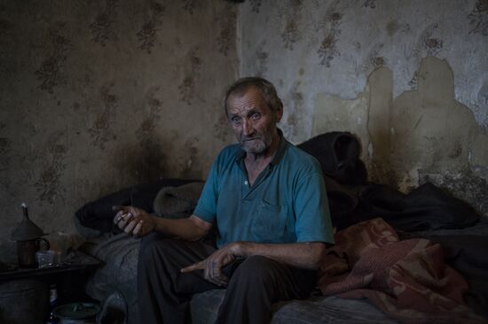 Residents of Staromikhailovka village in Donetsk region