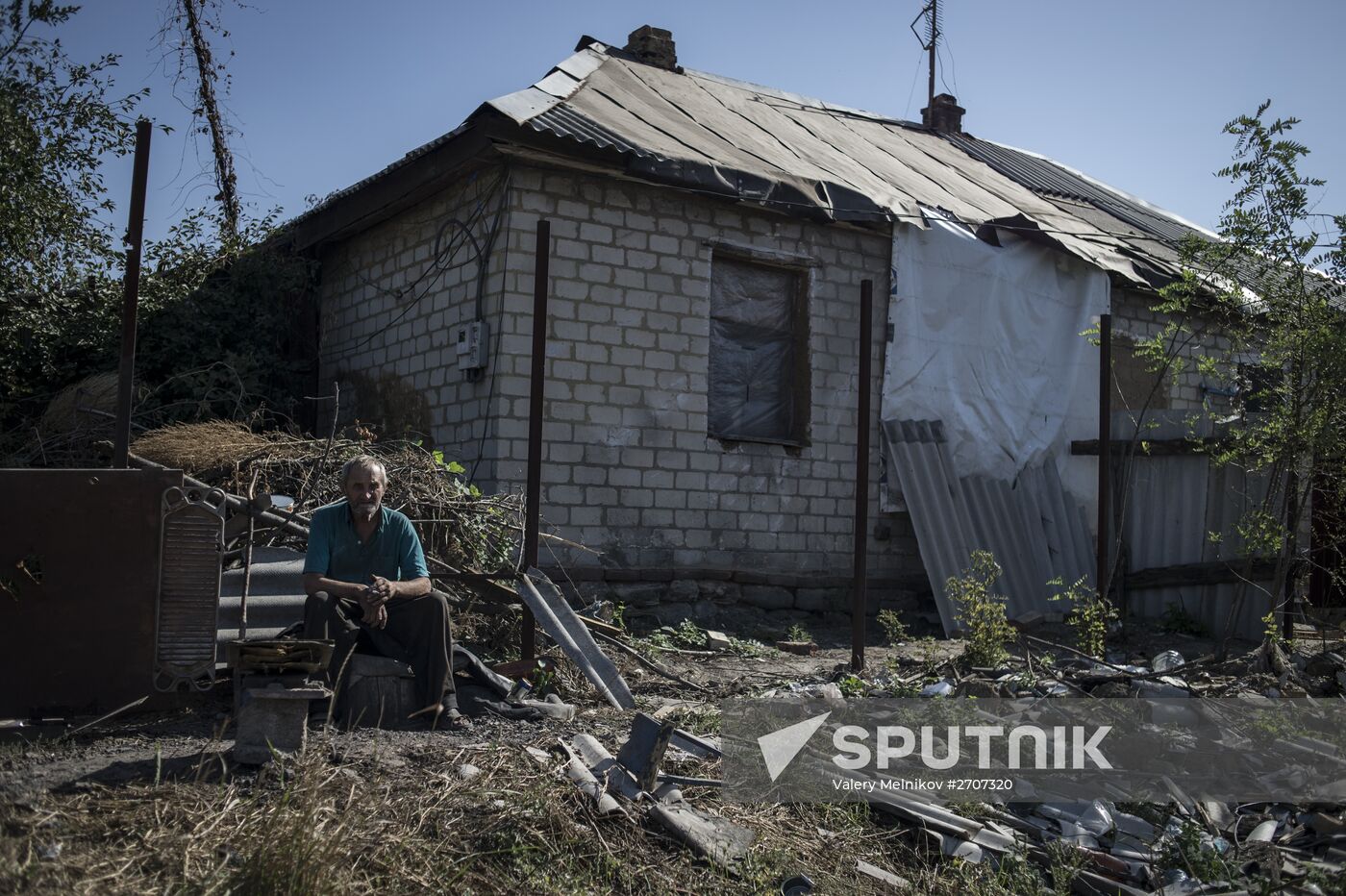 Residents of Staromikhailovka village in Donetsk region