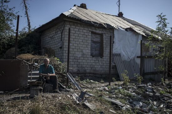 Residents of Staromikhailovka village in Donetsk region