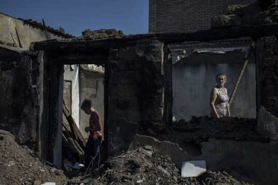 Residents of Staromikhailovka village in Donetsk region