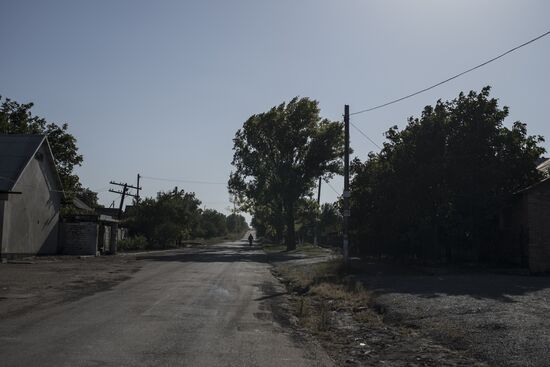 Residents of Staromikhailovka village in Donetsk region