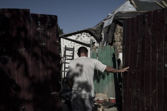 Residents of Staromikhailovka village in Donetsk region