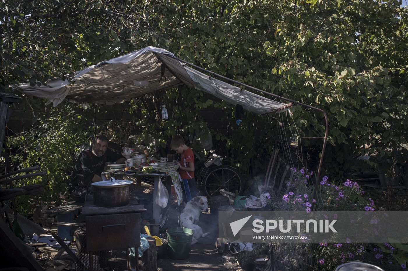 Residents of Staromikhailovka village in Donetsk region