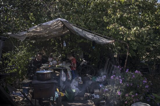 Residents of Staromikhailovka village in Donetsk region