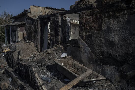 Residents of Staromikhailovka village in Donetsk region