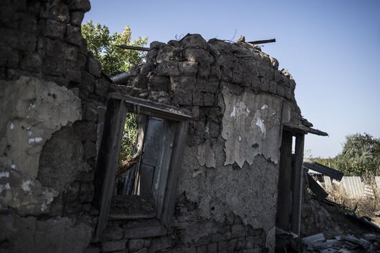 Residents of Staromikhailovka village in Donetsk region