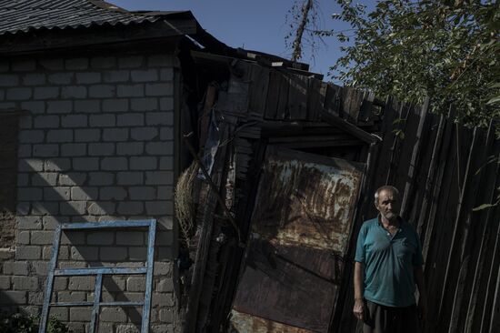 Residents of Staromikhailovka village in Donetsk region