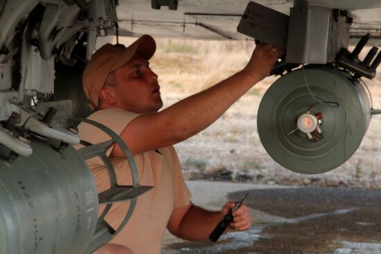Russian warplanes at an airfield near Latakia