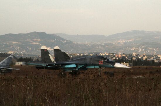Russian warplanes at an airfield near Latakia