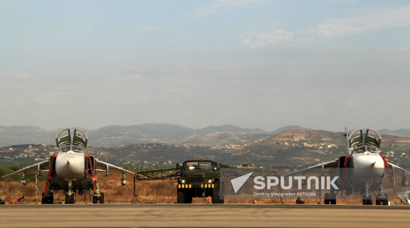 Russian warplanes at an airfield near Latakia