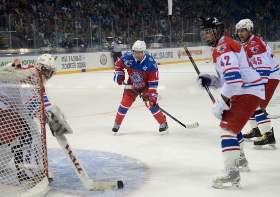 President Vladimir Putin during hockey match between Night Hockey League champions, board members and honorary guests
