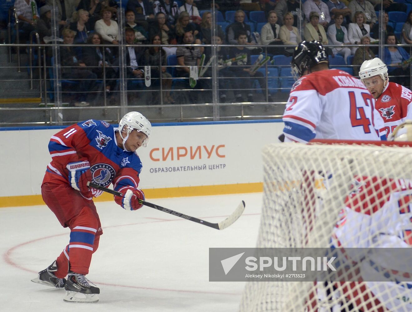 President Vladimir Putin during hockey match between Night Hockey League champions, board members and honorary guests