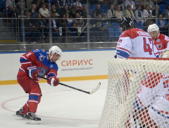 President Vladimir Putin during hockey match between Night Hockey League champions, board members and honorary guests