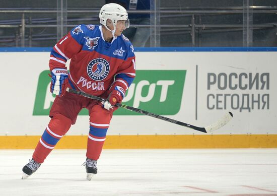 President Vladimir Putin during hockey match between Night Hockey League champions, board members and honorary guests