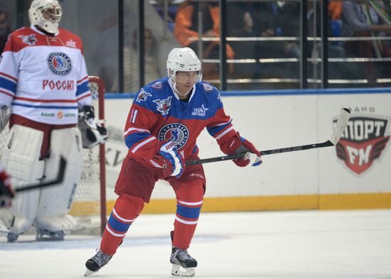 President Vladimir Putin during hockey match between Night Hockey League champions, board members and honorary guests
