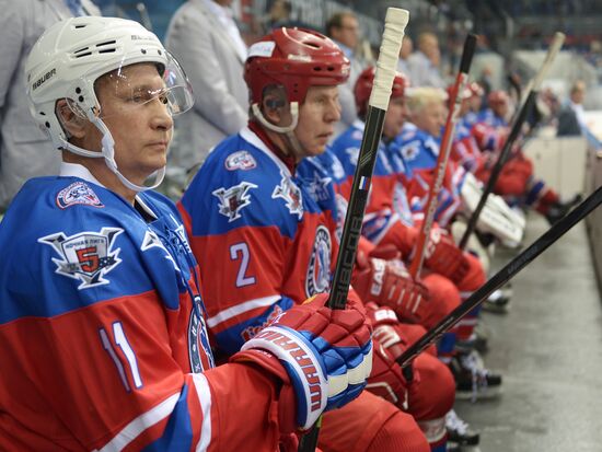 President Vladimir Putin during hockey match between Night Hockey League champions, board members and honorary guests