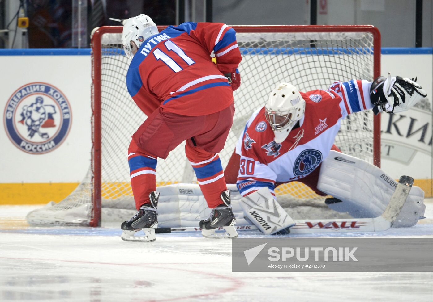 President Vladimir Putin during hockey match between Night Hockey League champions, board members and honorary guests