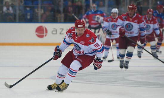 President Vladimir Putin during hockey match between Night Hockey League champions, board members and honorary guests