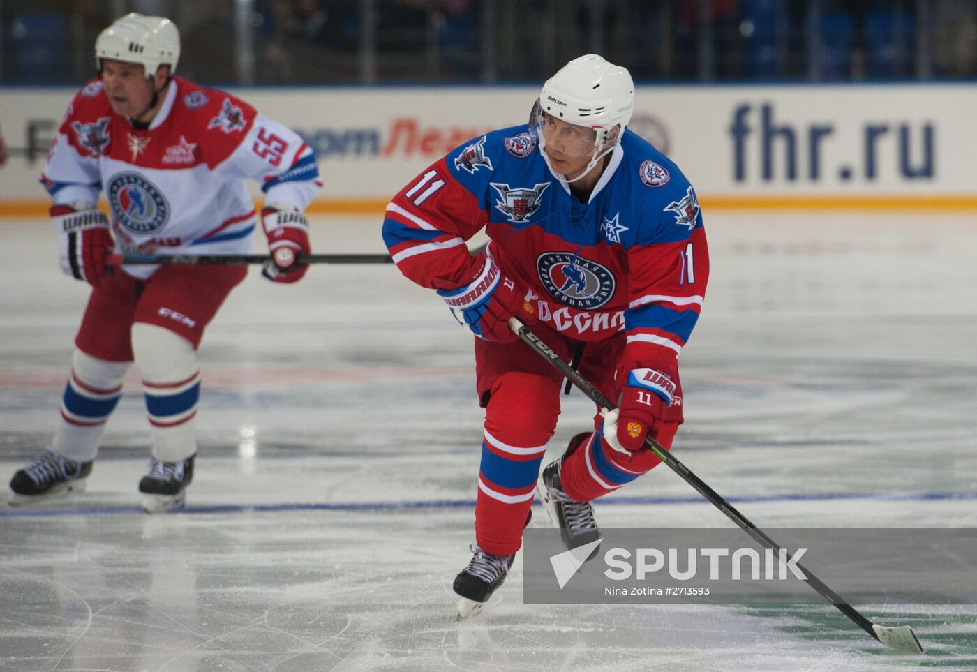 President Vladimir Putin during hockey match between Night Hockey League champions, board members and honorary guests