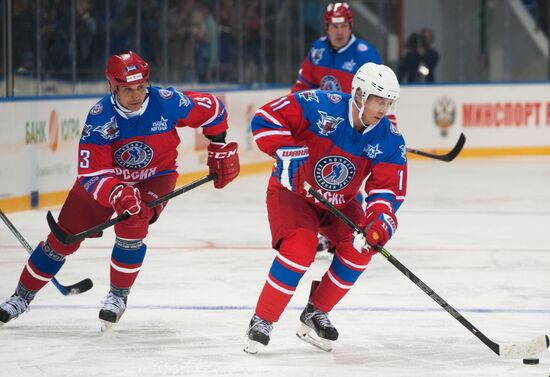 President Vladimir Putin during hockey match between Night Hockey League champions, board members and honorary guests