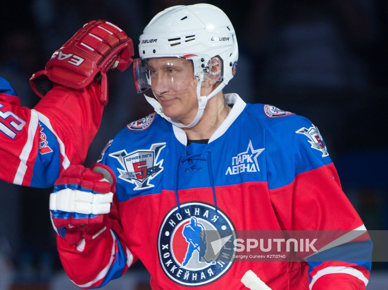 Vladimir Putin takes part in hockey match between Night Hockey League champions and board members and honorary guests