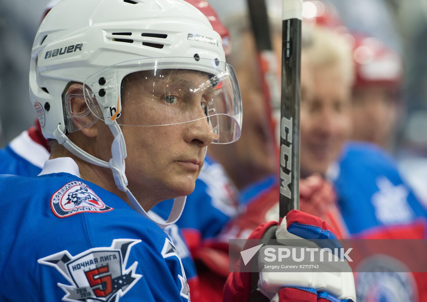 Vladimir Putin takes part in hockey match between Night Hockey League champions and board members and honorary guests