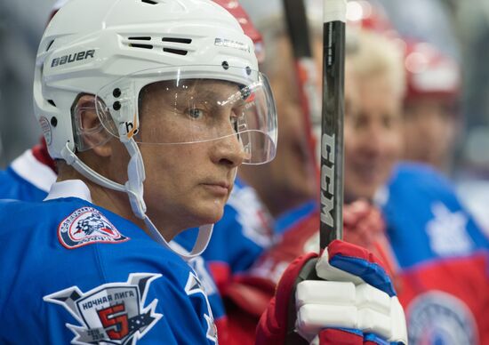 Vladimir Putin takes part in hockey match between Night Hockey League champions and board members and honorary guests