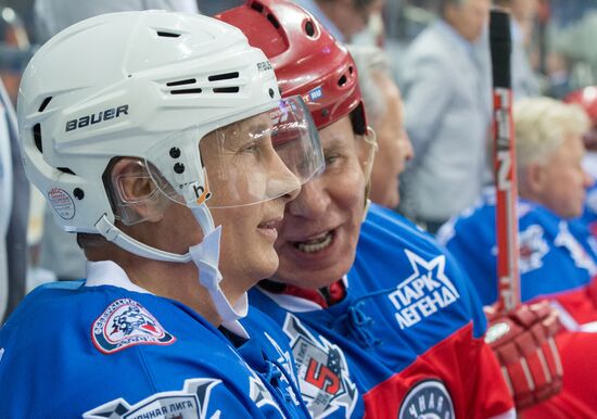 Vladimir Putin takes part in hockey match between Night Hockey League champions and board members and honorary guests