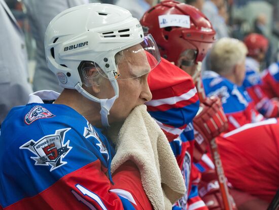 Vladimir Putin takes part in hockey match between Night Hockey League champions and board members and honorary guests
