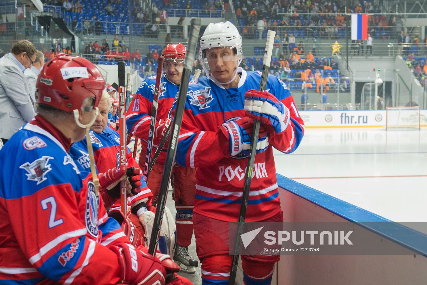 Vladimir Putin takes part in hockey match between Night Hockey League champions and board members and honorary guests