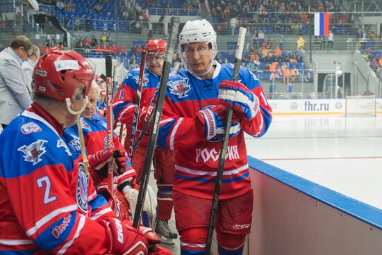 Vladimir Putin takes part in hockey match between Night Hockey League champions and board members and honorary guests