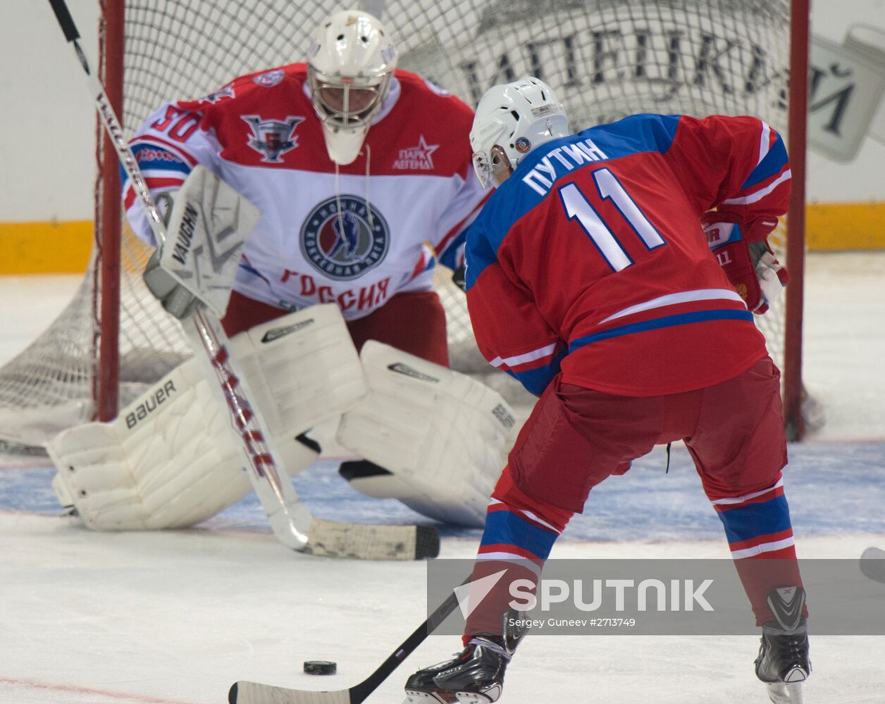 Vladimir Putin takes part in hockey match between Night Hockey League champions and board members and honorary guests